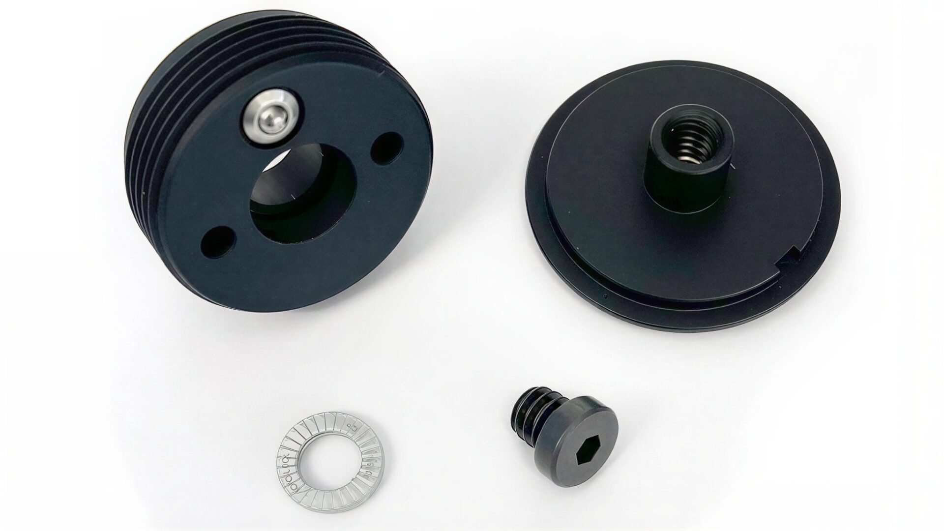 Black mechanical components on white background.